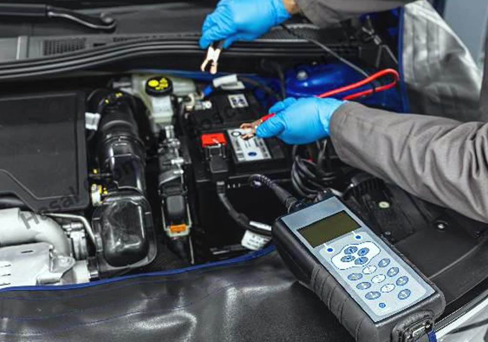 Man is Checking car battery because car battery is depleted. concept car maintenance